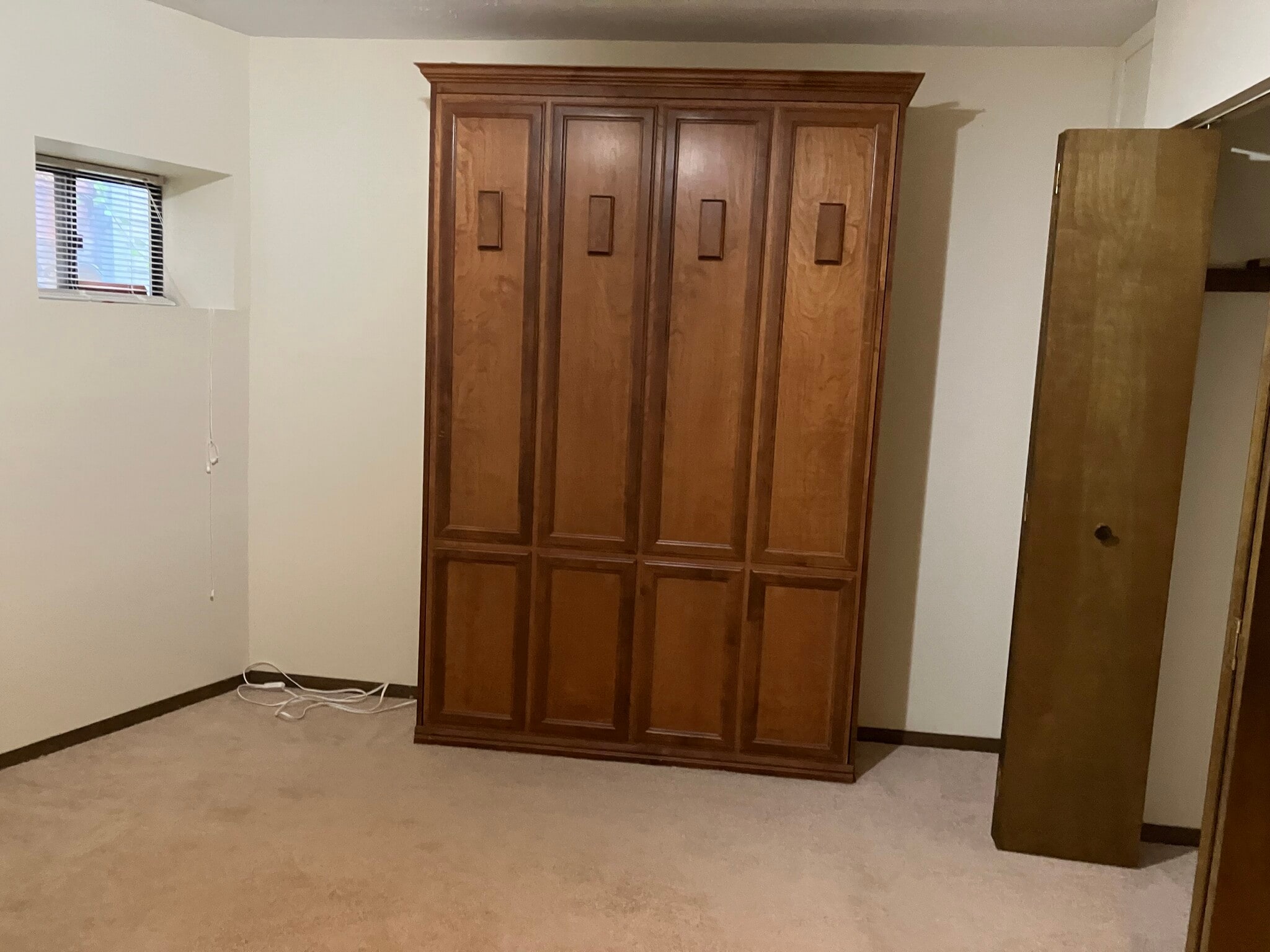 Bedroom #2 with Murphy bed closed - 6344 Aurelia St