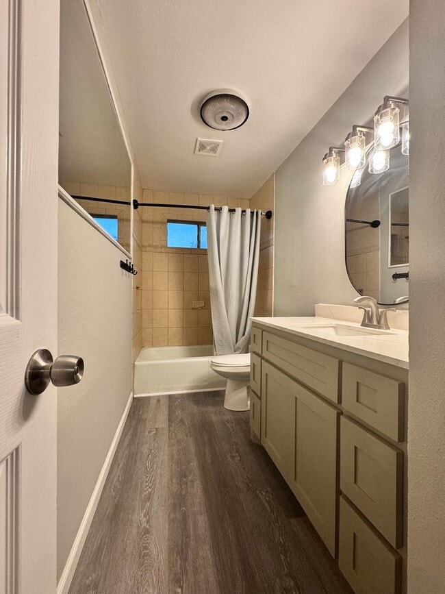 Building Photo - SECOND STORY CONDO WITH BILLS PAID