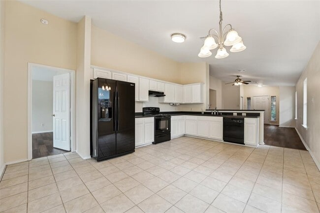 Building Photo - 11201 Canterbury Tales Ln
