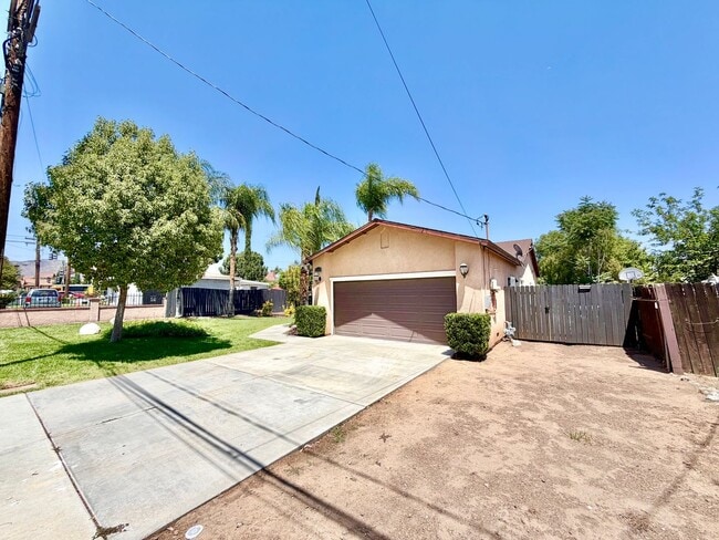 Building Photo - Beautifully Renovated 4 Bedroom Home with INCLUDED Solar, Large Backyard & Gazebo