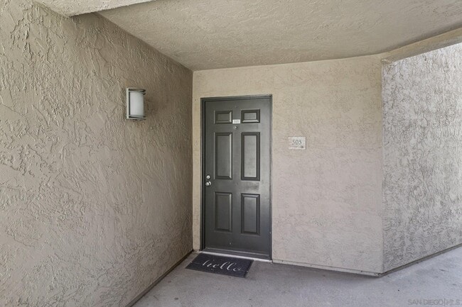 Building Photo - 7565 Charmant Dr