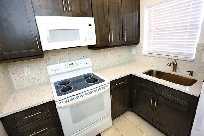 Building Photo - 8225 Sunrise Lakes Blvd