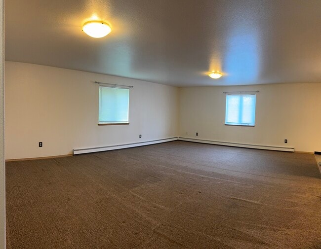 Open-concept design connecting the living area and kitchen. - 2979 Badger Rd