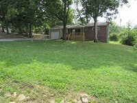 Building Photo - *Maryville 37804 - Charming 2 bedroom, 1 bath Brick Rancher with a 1-car garage - Call Adam Sharp...