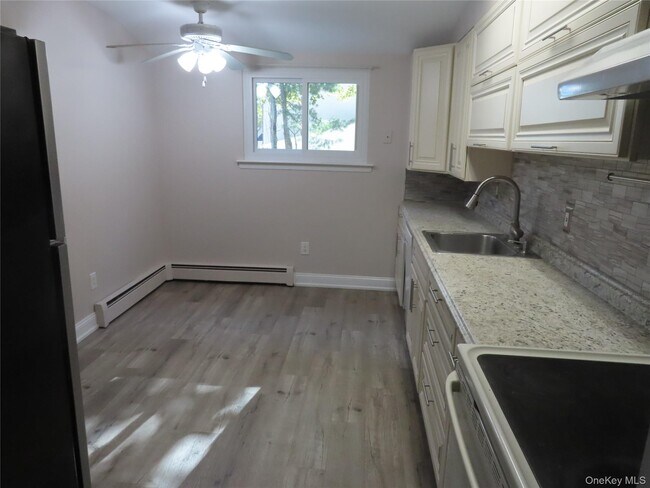 Building Photo - 1210 Smithtown Ave