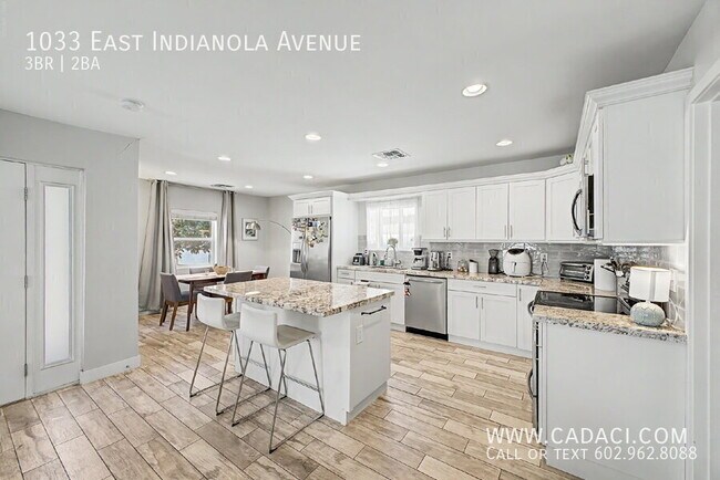 Building Photo - 1033 E Indianola Ave