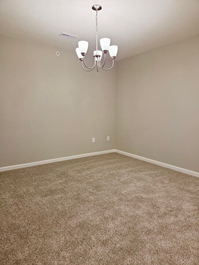 Building Photo - Exquisite just built condo with everything! Ground floor, no stairs, attached garage