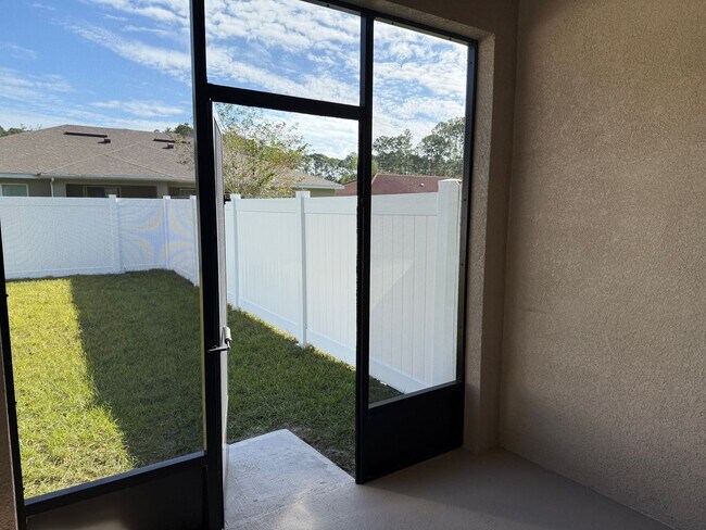 Building Photo - Brand new 3/2/1 with screed in porch and fenced yard! 2 units available