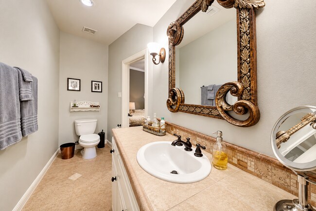 Building Photo - A Gated River Park Estate Where Timeless Tudor Elegance Meets Resort-Style Living