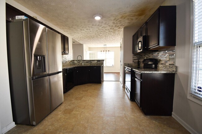 Building Photo - Coming Soon-4 Bedroom 2 Bathroom, Small Pets Considered