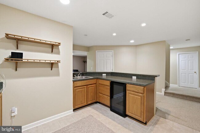 Building Photo - 5767 Bush Hill Dr