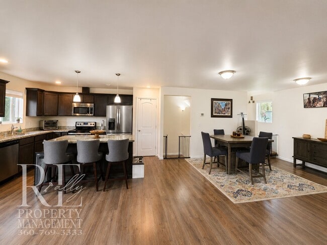 Building Photo - Spacious 3-Story Home with Flexible Living Space, Heat Pump & Private Deck Retreat