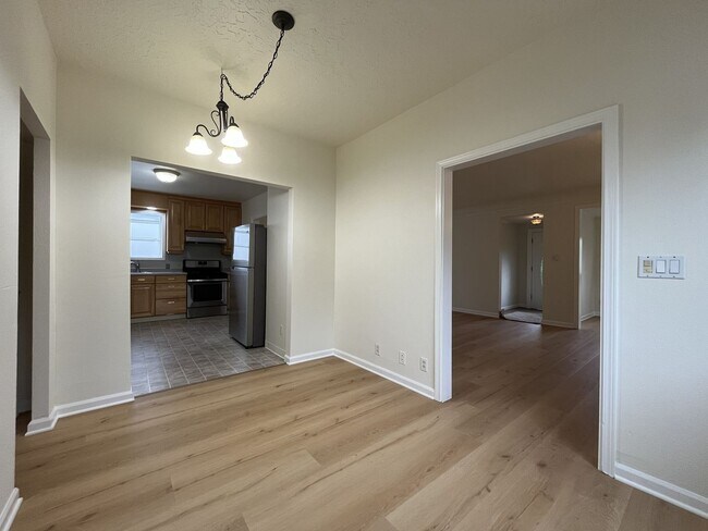 Building Photo - Character-Filled Concordia Home with Flexible Living Spaces & Gas Fireplace