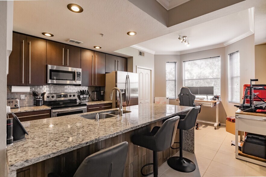 Breakfast bar/island. - 8331 Whiskey Preserve Cir