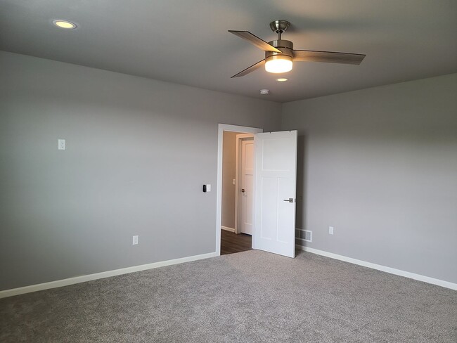 Building Photo - Four Bedroom Three Bath Single Family Home