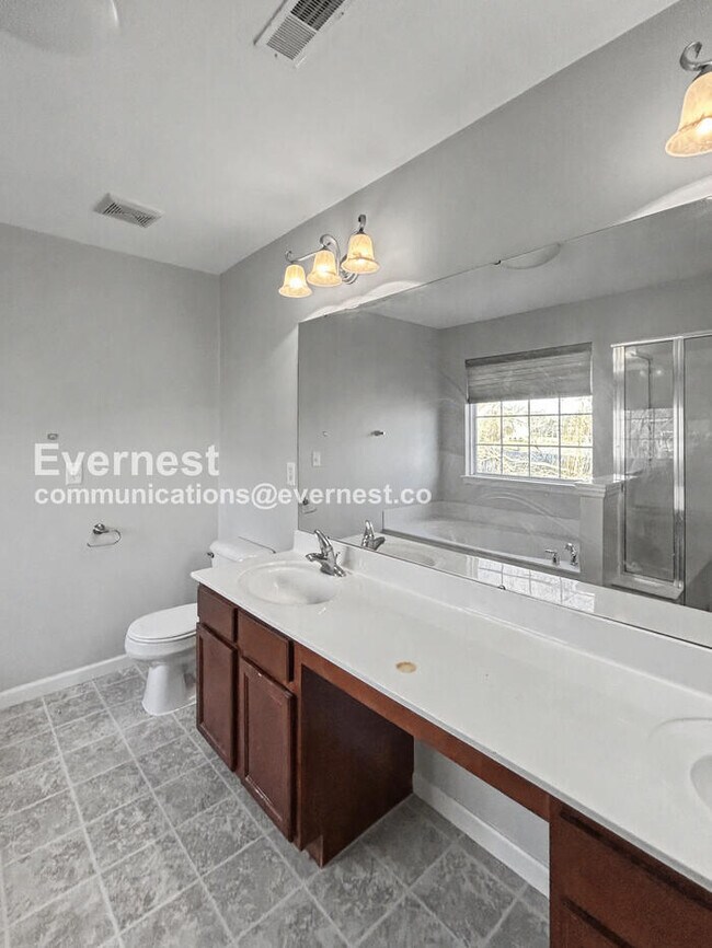 Building Photo - Spacious 4-Bed Home with 2-Car Garage & Modern Amenities