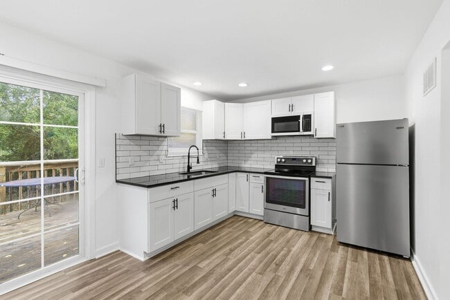 Building Photo - Everything upgraded on this 4 bedroom — top-notch finishes throughout!