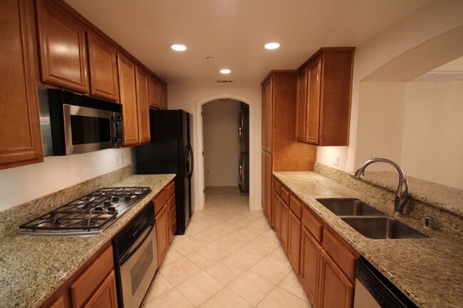 Building Photo - $1000 MOVE IN SPECIAL! Large, Updated 2 BD, 2 BA Condo w/ EV CHARGING