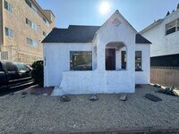 Building Photo - Two Bedroom Front House near Westside Village