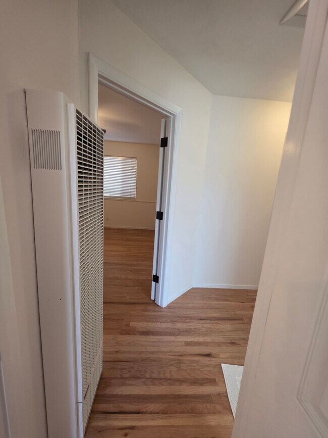 Building Photo - Delightful Single Story 2/2 with Expanded Bath and Beautiful Gardens