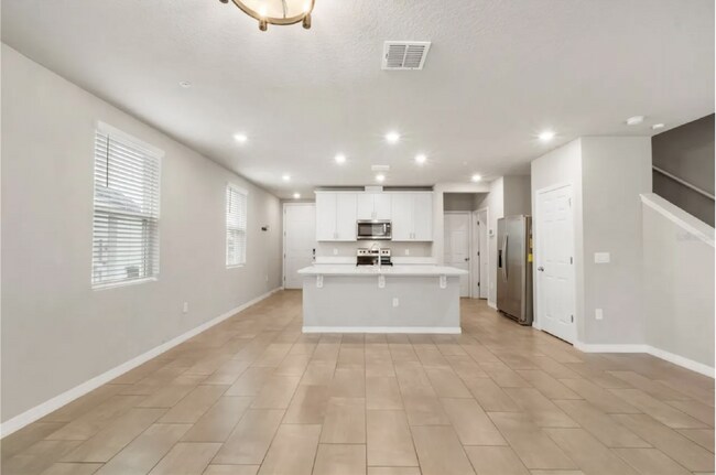 Building Photo - Charming 3-Bed Oasis in Ocoee: Spacious 1574 sq. ft. Townhouse with 2.5 Baths!