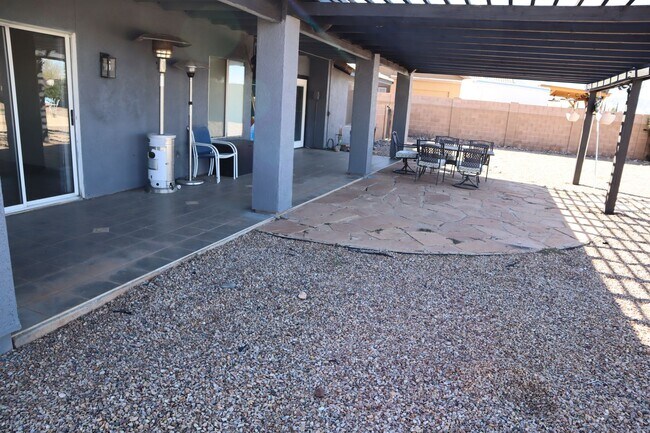 Building Photo - Home With A Pool and Much More!