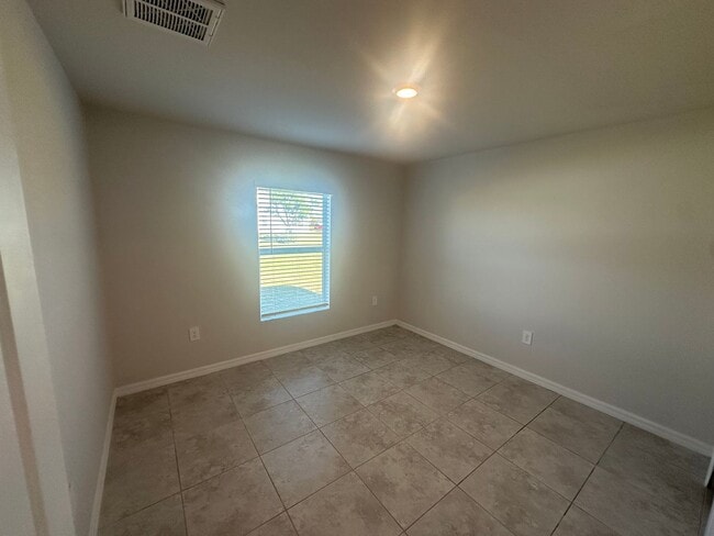 Building Photo - NE Cape Coral- Gator Circle Home- 4 Bedroom 2 Bathrooms 3 Car Garage