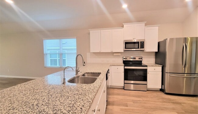 Building Photo - 3/2 in VOSS FARMS