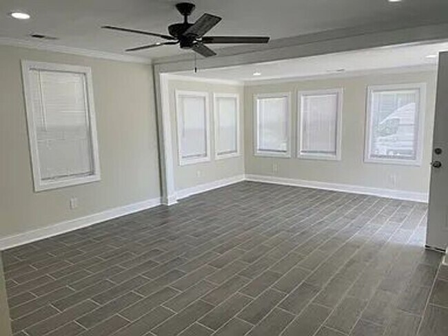 Building Photo - NEWLY REBUILT ONE LEVEL LIVING SPACE