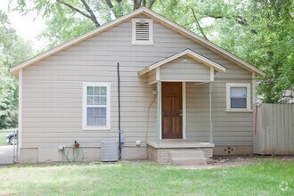 Building Photo - Charming 2-Bedroom Home with Spacious Back...
