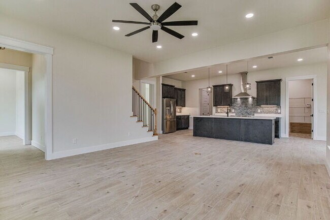 Building Photo - This luxurious new custom home in the sought-after Shadow Grove subdivision is a masterpiece of m...