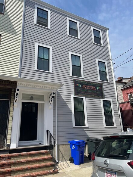 Brand new exterior siding and windows - 34 F St