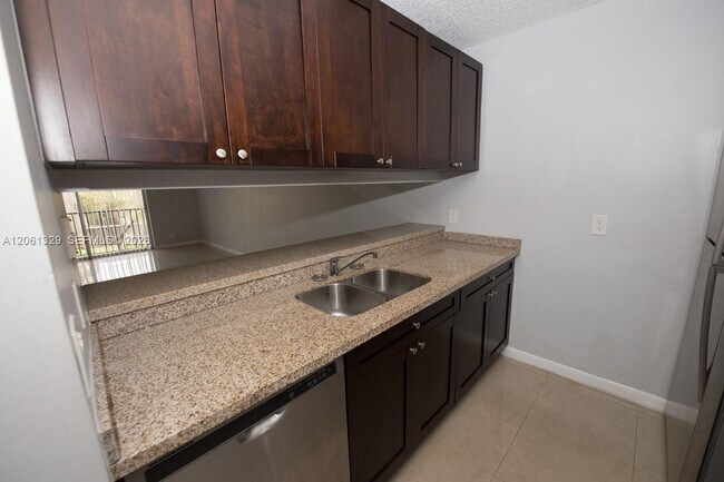 Building Photo - 8550 N Sherman Cir