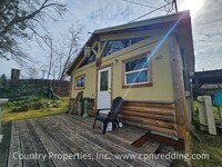 Building Photo - Updated 2-Bedroom House With Refrigerator ...