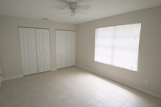 Building Photo - Spacious 3BR/2BA Home | Large Yard | Lawn Care Included | Prime Port St. Lucie Location