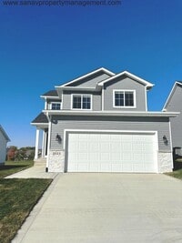 Building Photo - "Charming Family Living: 3BR, 2BA Home Steps Away from High School, Triumph Park, and Sugar Creek...