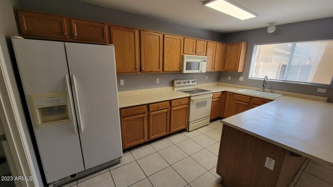 Building Photo - 5846 W Gelding Dr