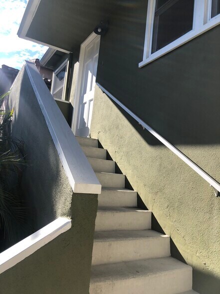 Stairs up to unit - 1033 Pearl St