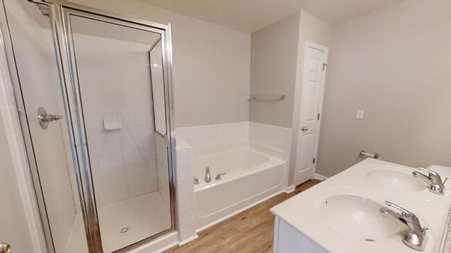 Building Photo - Townhome | Hard Surface Floors Through-Out...