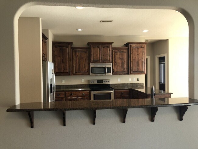 Building Photo - 4BR / 3Car garage / Fully fenced in backyard - Stunning property