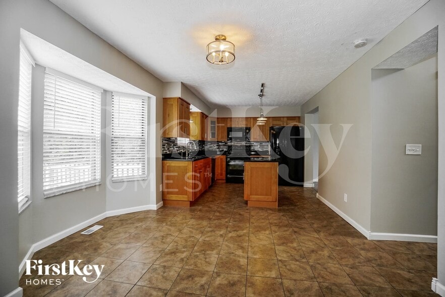 Building Photo - 5947 Heritage Farms Dr