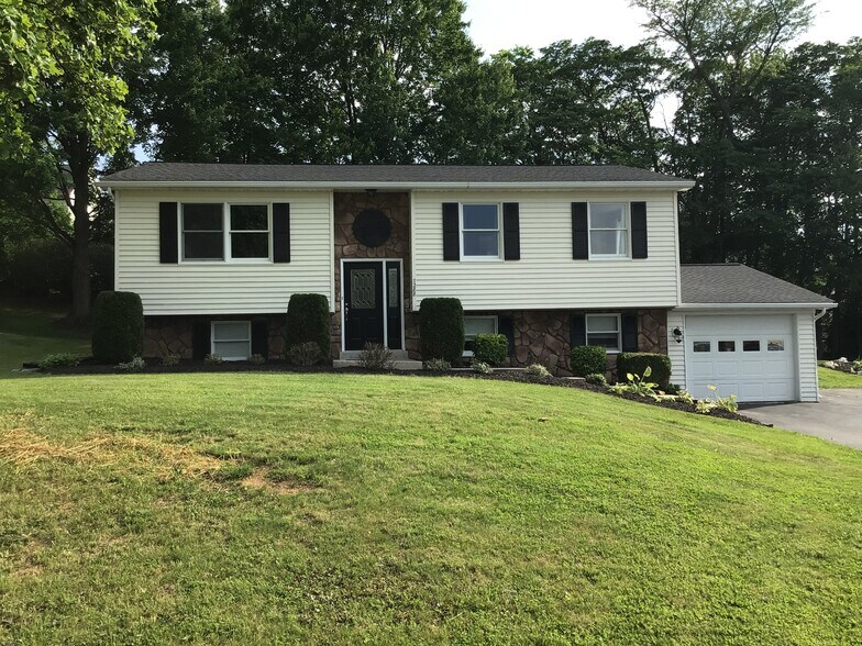 I had all the bushes and trees trimmed this summer. - 7288 Beechtree Ln