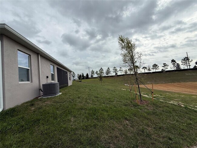 Building Photo - 7117 Dilly Lake Ave