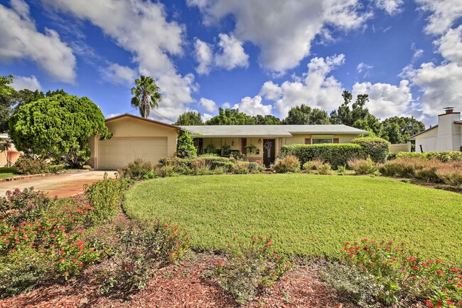 Lush Manicured Landscaping and Parking for four Cara - 6181 39th Ave N