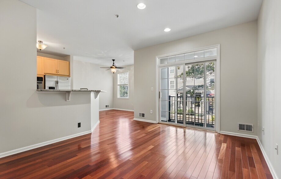 Living area with balcony. - 107 Brittany Ct