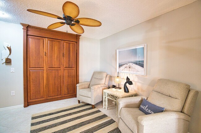 Building Photo - Seasonal Short-Term 2 Bed 2 Bath Heated Pool Villa with a Den in Harrington Lakes at Planation Go...