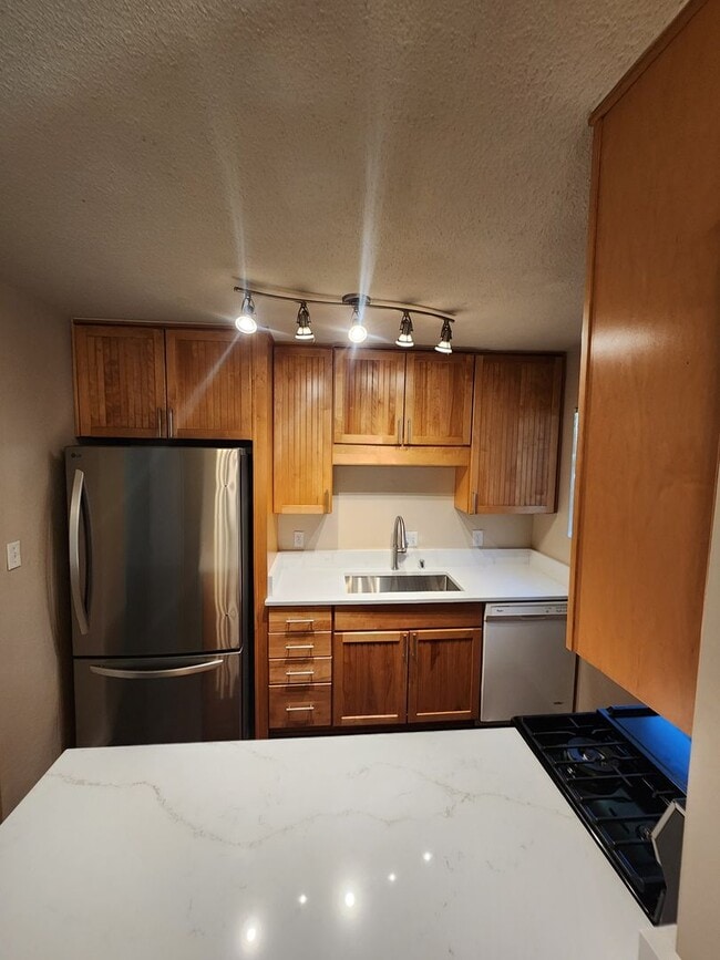 Building Photo - Action Properties R.E.S.- Central Roseville, R.V. Access, 3 Bedroom, Large Patio & Rear Yard, Nea...