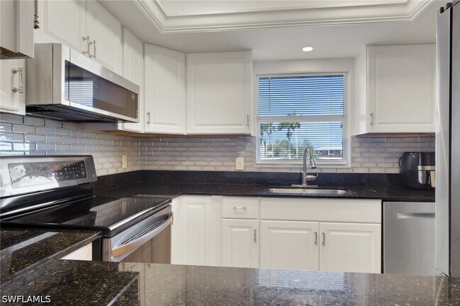 Building Photo - 4912 Tamiami Trl E