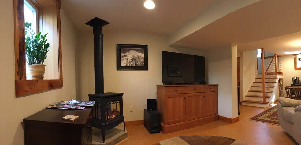 Basement living room toward stairs - 4054 NE Rodney Ave