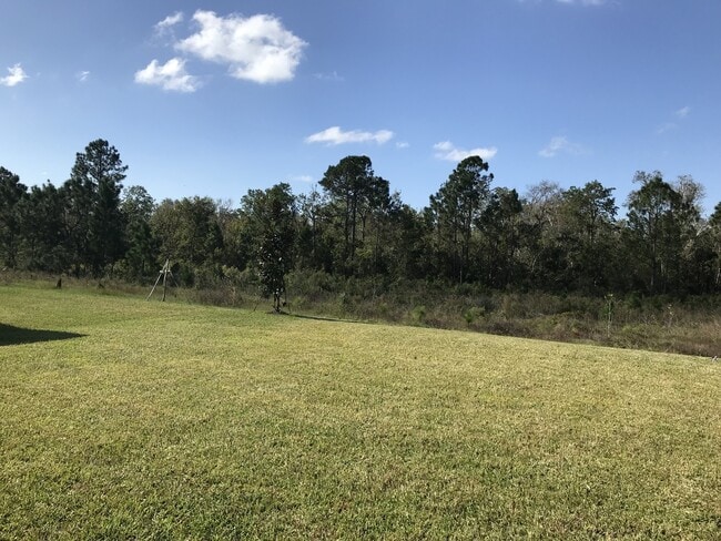 Building Photo - NEWER 3/2 Plus Den Home at The Oaks in Mos...